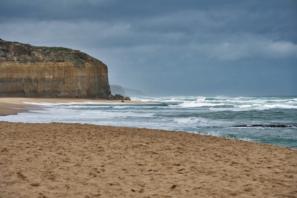 Black Cliff Beach with the huge cliff at the shore of Atlantic Ocean